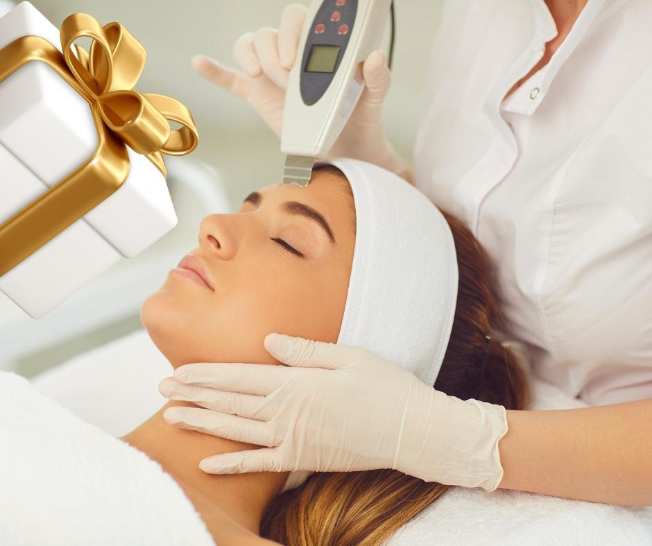 Woman receiving facial treatment at Aesthetics Medical Clinic for a glowing and rejuvenated holiday look.